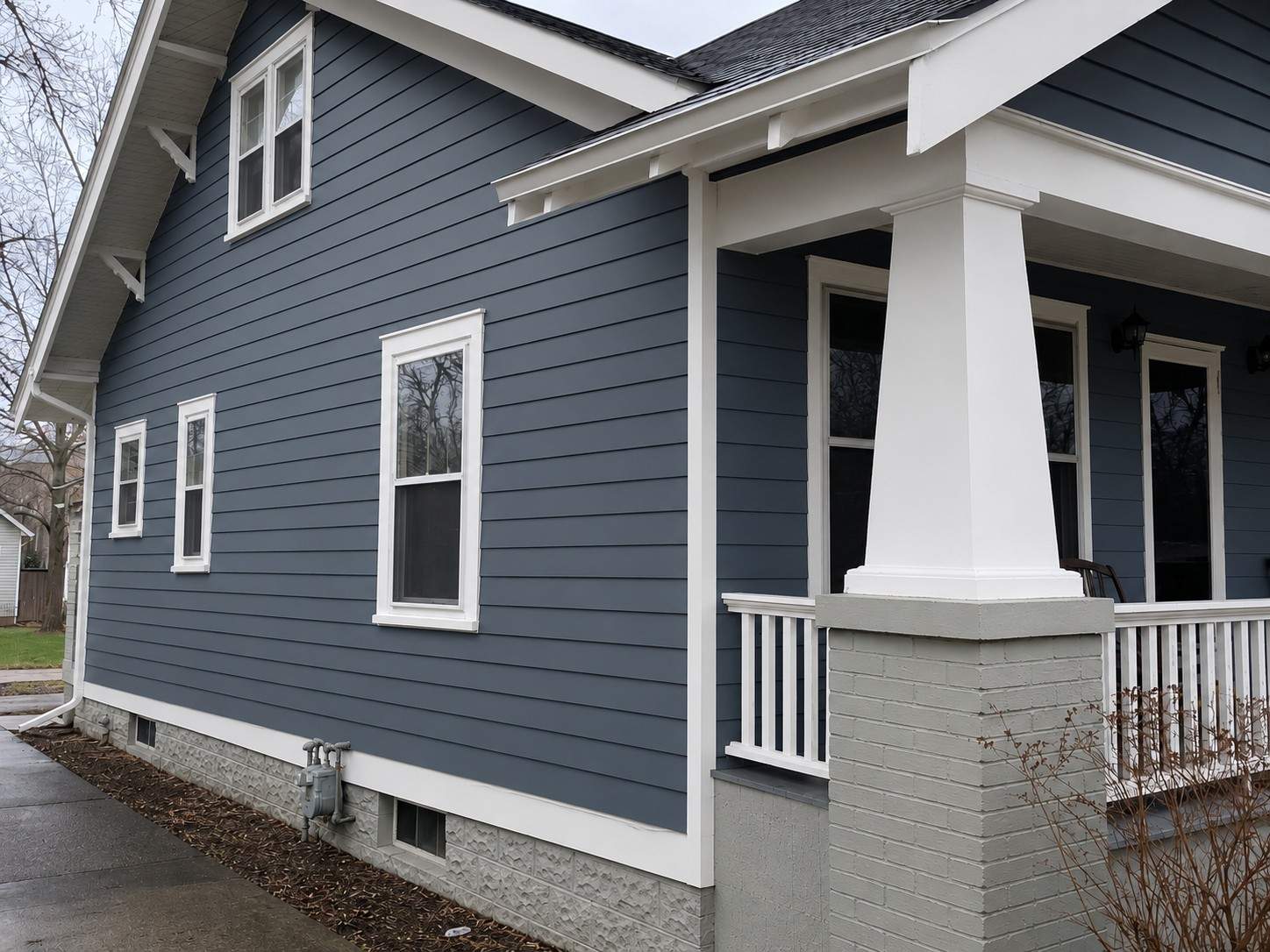 Vinyl siding transformation after project | Home Improvement Contractor in Central Michigan